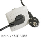 Электрическая розетка и электрические вилки на белом фоне. Electrical plug and electric socket on white background. Стоковое фото, фотограф Татьяна Д / Фотобанк Лори