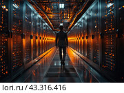 A man in a business suit walking along the corridor between rows of server racks in a data center. The server racks are illuminated with bright orange lights, creating a technological and futuristic atmosphere. The ceiling is littered with pipes and cables, highlighting the complexity of the infrastructure. The floors are shiny and reflect light, adding depth and contrast to the image. This image symbolizes high technology, information technology and data management. Стоковое AI-изображение, AI-художник Анна Кривицкая / Фотобанк Лори