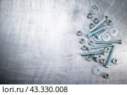 Working tool. Nuts and bolts on the table. Стоковое фото, фотограф Артем Шадрин / Фотобанк Лори
