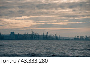smoke after the explosion in the seaport war in Ukraine (2024 год). Стоковое фото, фотограф Артем Курутин / Фотобанк Лори