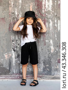High fashion look.glamor stylish beautiful happy surprised little girl model in summer black and whitel cloth on background. Emotion. Стоковое фото, фотограф Ирина Михайличенко / Фотобанк Лори