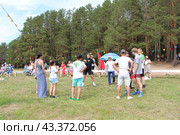 Конкурс поднятия гири на празднике "Сабантуй" (2024 год) Редакционное фото, фотограф хохрякова альбина накиповна / Фотобанк Лори
