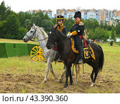 Historical reconstruction in beautiful historical and authentic costumes at festival Times and Epochs in Moscow. Russian hussars (2024 год). Редакционное фото, фотограф Валерия Попова / Фотобанк Лори