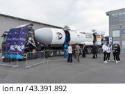BERLIN - JUNE 05, 2024: The SPACEBUZZ ONE of the German Space Agency at DLR is a truck with a trailer in the shape of a rocket of a education program to complement STEM lessons. ILA Berlin Air Show. Редакционное фото, фотограф Sergey Kohl / Фотобанк Лори
