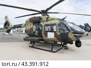 BERLIN - JUNE 05, 2024: Light utility helicopter Airbus Helicopters H145M (formerly Eurocopter EC145) by German Air Force. ILA Berlin Air Show 2024. Редакционное фото, фотограф Sergey Kohl / Фотобанк Лори