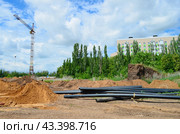 ПНД трубы на стройке. Стоковое фото, фотограф Staryh Luiba / Фотобанк Лори