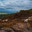 Mountain lake time-lapse at the summer or autumn time. Wild nature and rural field. Clouds movement, green grass and dramatic sky. Motorised dolly slider. Стоковое видео, видеограф Александр Маркин / Фотобанк Лори