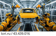 The production of a motor vehicle is underway at a factory with the help of robots. Стоковое AI-изображение, AI-художник Юрий Поздников / Фотобанк Лори