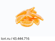 Marmalade slices with orange flavor on a white background. Close-up. Isolated. Стоковое фото, фотограф Ярославский Максим / Фотобанк Лори
