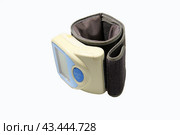 A small wrist tonometer on a white background is isolated. Стоковое фото, фотограф Ярославский Максим / Фотобанк Лори