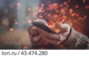 A person is holding a phone with "like", "message", "comment" and "like" notification icons floating above the smartphone screen, as well as with social networks and digital communications. Стоковое видео, видеограф Терехова Марина / Фотобанк Лори