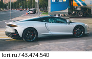 Luxurious super car McLaren GT on city street. Редакционное фото, фотограф Константин Григорьев / Фотобанк Лори