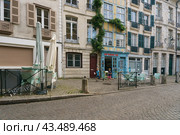 Bayonne, France - June 19, 2019: European medieval cityscape. Touristic theme in summer day. Редакционное фото, фотограф YuryKara / Фотобанк Лори