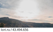 Mountain lake time lapse in summer or autumn. Wild nature and beautiful sunset. Moving clouds, deep twilight and dramatic sky. Стоковое видео, видеограф Александр Маркин / Фотобанк Лори