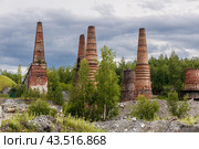 Pipes of old lime kilns on the abandoned marble and lime factory on a frosty January morning. Ruskeala, Karelia. Russia. Стоковое фото, фотограф Ольга Сейфутдинова / Фотобанк Лори