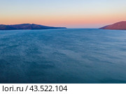 Beautiful morning view of the sea. Aerial landscape of the sea bay and coast. View of the horizon. Ripples on the surface of blue water. Nagaev Bay, Sea of ​​Okhotsk, Magadan Region, Far East Russia. Стоковое фото, фотограф Андрей Степанов / Фотобанк Лори