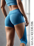 Backside close-up of woman hips woman in fit sportswear at home, domestic fitness workout. From behind of slim lady athletic glutes and legs, perfect fit. Healthy lifestyle concept. Copy ad text space. Стоковое AI-изображение, AI-художник Aleksandr Golubev / Фотобанк Лори
