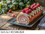 Swiss sponge roll with raspberries, a delicious fruit and cream dessert filled with cream cheese, decorated with fresh raspberries. Стоковое AI-изображение, AI-художник Photojuli / Фотобанк Лори