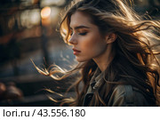 A beautiful, young woman with a thoughtful look. The hair develops in the wind and gives a feeling of lightness and naturalness. Стоковое AI-изображение, AI-художник Photojuli / Фотобанк Лори