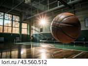 A basketball is flying into the ring on the basketball court. A goal. The ball is in close-up. Стоковое AI-изображение, AI-художник Photojuli / Фотобанк Лори