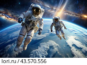 Happy Cosmonautics Day. Astronauts in a spacesuit in outer space. Spectacular view of the planet Earth. Стоковое AI-изображение, AI-художник Photojuli / Фотобанк Лори