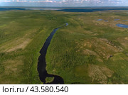 Arctic tundra in summer from an altitude of 2000 meters. Cloudy sky. Variety of colors and landscapes. The vastness of pristine nature. Shadow from the clouds. Стоковое фото, фотограф Владимир Ендовицкий / Фотобанк Лори