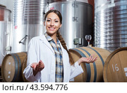Woman sommelier is tasting wine at wine factory. Стоковое фото, фотограф Татьяна Яцевич / Фотобанк Лори