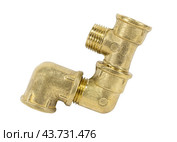 Латунный фитинг для поворота и соединения труб в сантехнике. Brass fitting for plumbing on the white background. Стоковое фото, фотограф Татьяна Д / Фотобанк Лори