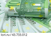 Евро купюры как фон. Background of the one hundred Euro banknotes. Стоковое фото, фотограф Татьяна Д / Фотобанк Лори