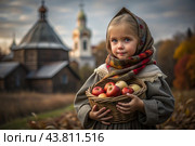 The concept of the Russian Orthodox holiday Yablochny Spas. A beautiful girl in Russian national clothes with a basket of red ripe apples on the background of an Orthodox church. Стоковое AI-изображение, AI-художник Photojuli / Фотобанк Лори