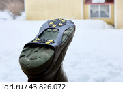 Studded overlay on sole of footwear will help prevent slipping on black ice and prevent injury. Стоковое фото, фотограф Владимир Григорьев / Фотобанк Лори