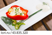 Image of pepper stuffed with brynza in plate. Стоковое фото, фотограф Яков Филимонов / Фотобанк Лори