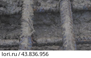 Pouring concrete into a metal structure заливают бетоном металлическую конструкцию. Стоковое видео, видеограф Опока Алексей / Фотобанк Лори