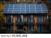 Solar battery on the roof of house near Electrical towers. PV plants generate your own electricity plug play. Power photovoltaic plant. Solar Panel energy system. Стоковое AI-изображение, AI-художник Ирина Михайличенко / Фотобанк Лори