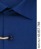 Button placket on a plain dark blue men's shirt, close-up. Стоковое фото, фотограф Сергей Чайко / Фотобанк Лори