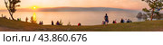 BAIKAL LAKE, OLKHON ISLAND, KHUZHIR VILLAGE, IRKUTSK REGION, RUSSIA - August 03, 2024: Panorama of 52 vertical shots of people enjoying beautiful sunset over Small Sea in summer evening. Редакционное фото, фотограф Виктория Катьянова / Фотобанк Лори