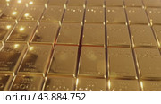 Glowing gold bars ready to be stored in the national money reserve fund. Стоковое видео, видеограф Олег Грач / Фотобанк Лори