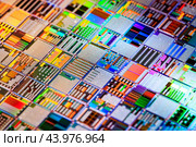 Silicon semiconductor wafer close-up. In electronics, a wafer also called a slice or substrate is a thin slice of semiconductor, a crystalline silicon, used for the fabrication of integrated circuits. Стоковое фото, фотограф Андрей Армягов / Фотобанк Лори