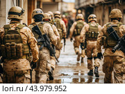 War. Military actions. Soldiers of the elite anti-terrorist unit of the army among the broken buildings. Clearing the territory from the enemy. Стоковое AI-изображение, AI-художник Photojuli / Фотобанк Лори