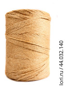 A large skein of strong harsh threads for filing documents on a white background in isolation. Стоковое фото, фотограф Ярославский Максим / Фотобанк Лори