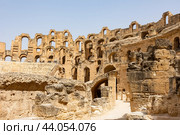 Impressive ruins of the largest colosseum in North Africa, huge Roman amphitheater in small village of El Jem, Tunisia. Стоковое фото, фотограф Яков Филимонов / Фотобанк Лори