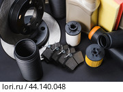 Auto parts. Spare parts for the repair of cars. Top view. Стоковое фото, фотограф Никита Бурденков / Фотобанк Лори