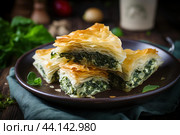 Mouth-watering Spanakopita greek pastry. Generate Ai. Стоковое AI-изображение, AI-художник Иван Рябоконь / Фотобанк Лори