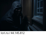 Burglar in mask breaking into house at night. Стоковое AI-изображение, AI-художник Иван Рябоконь / Фотобанк Лори