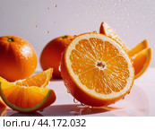 Fresh juicy oranges with drops of water scattered on fruits on a light neutral background taken in close-up. Стоковое AI-изображение, AI-художник Ольга Пахомова / Фотобанк Лори