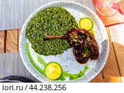 Duck leg with rice in demi-glace sauce. Стоковое фото, фотограф Евгений Ткачёв / Фотобанк Лори