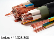 Various Electrical Wires With Exposed Copper Strands on White Background. Стоковое фото, фотограф Сергей Толмачёв / Фотобанк Лори