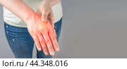 Carpal tunnel syndrome, arthritis, neurological disease concept. Numbness of hand. Closeup of female arms holding his painful wrist caused by prolonged work on computer, laptop. copy space. Стоковое фото, фотограф Павел Муравьев / Фотобанк Лори