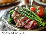Enticing Asparagus ham plate. Generate Ai. Стоковое AI-изображение, AI-художник Иван Рябоконь / Фотобанк Лори