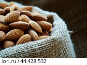 Bite-sized Almond sack snack. Generate Ai. Стоковое AI-изображение, AI-художник Иван Рябоконь / Фотобанк Лори